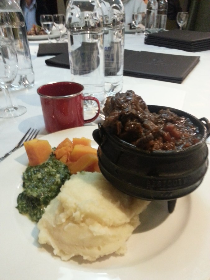 Final dinner at the hotel - Ox Tail - complete with my red camping cup that got a lot of use
